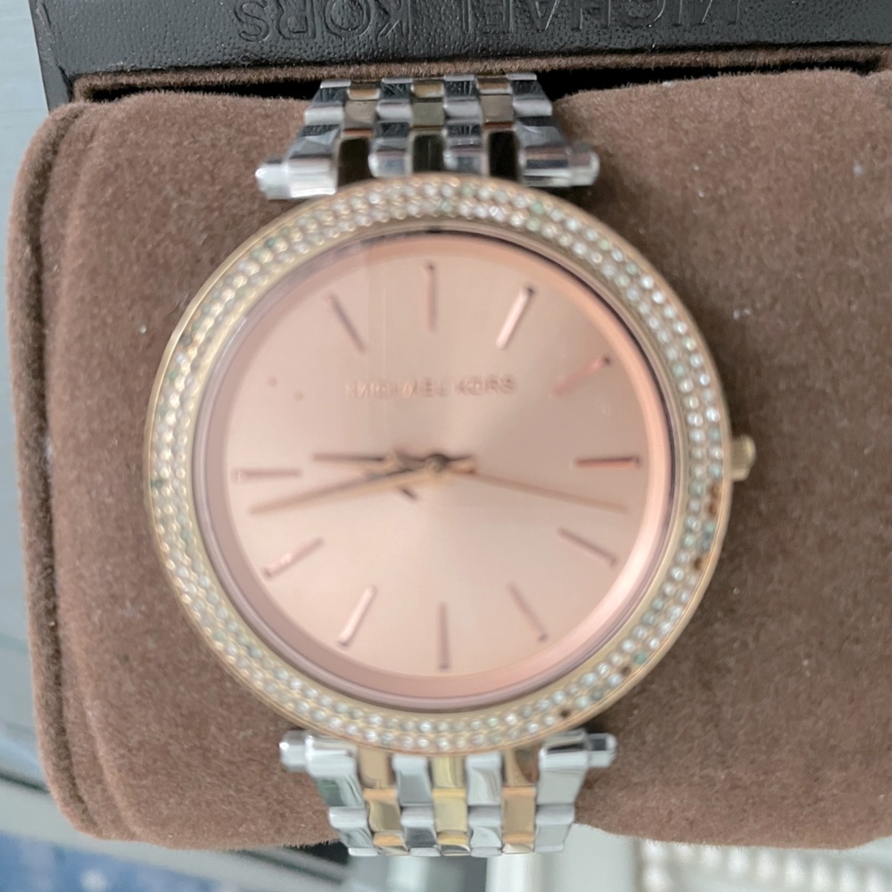 Michael Kors two tone watch.